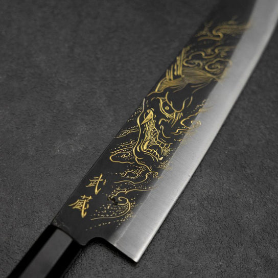 Gyuto Blue Steel #2 Kurouchi Chokin Hannya Mango de Búfalo Ébano 210mm